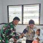Satgas Yonif 715/Mtl Hadirkan Senyum Melalui Pelayanan Kesehatan